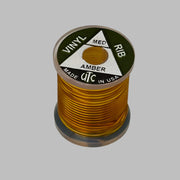 Vinyl D-rib cord spool in amber gold, ribbed flexible vinyl winding
