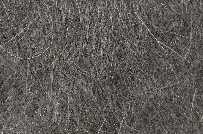 Fly tying dubbing fibers in dark gray