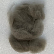 Gray fly tying dubbing fibers clump, soft and fluffy