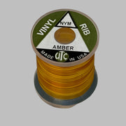 Vinyl D-rib spool of Amber vinyl trim, wound on a small reel