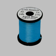 Aqua blue stretch thread spool with label on top, 30 yd