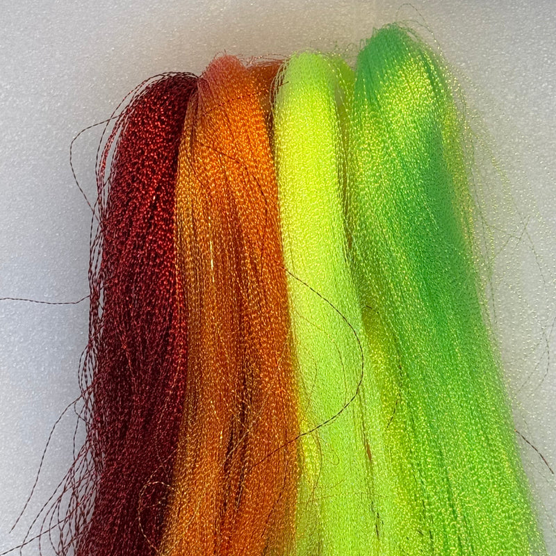 Wapsi Midge Flash fly tying flash strands in dark red, orange, and chartreuse
