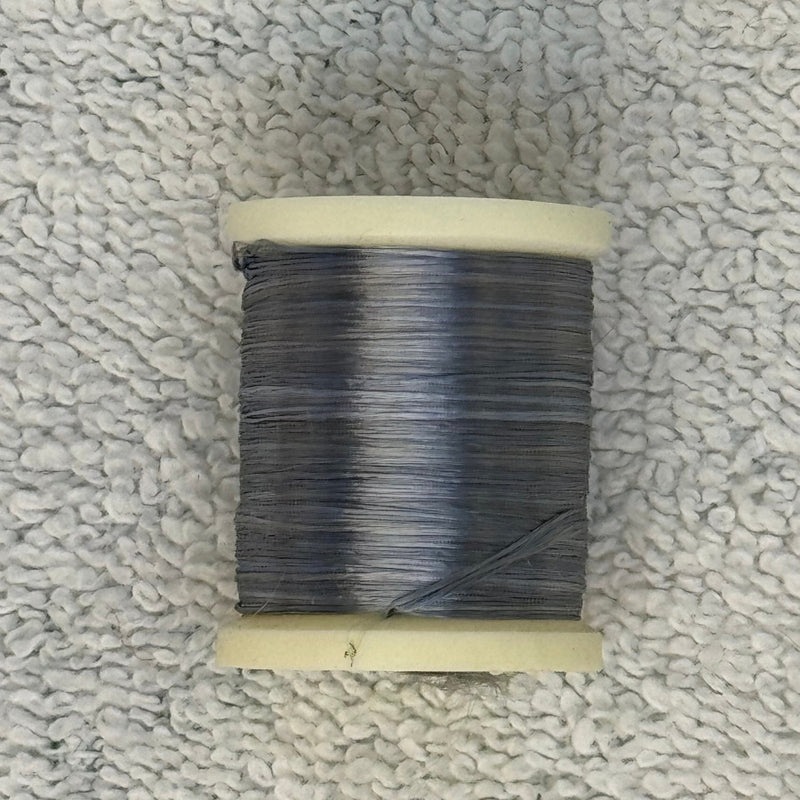 Four-strand floss spool in dark gray-blue