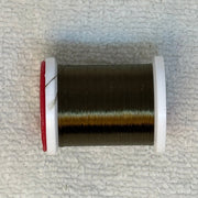Spool of 70 denier thread in dark brown with gold sheen