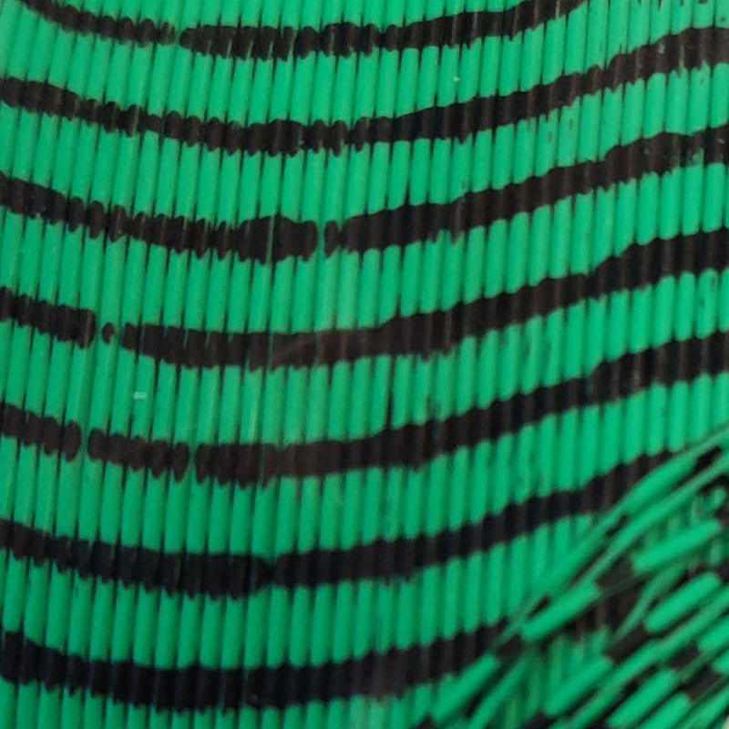 Round rubber strip, bright green with black barred stripes
