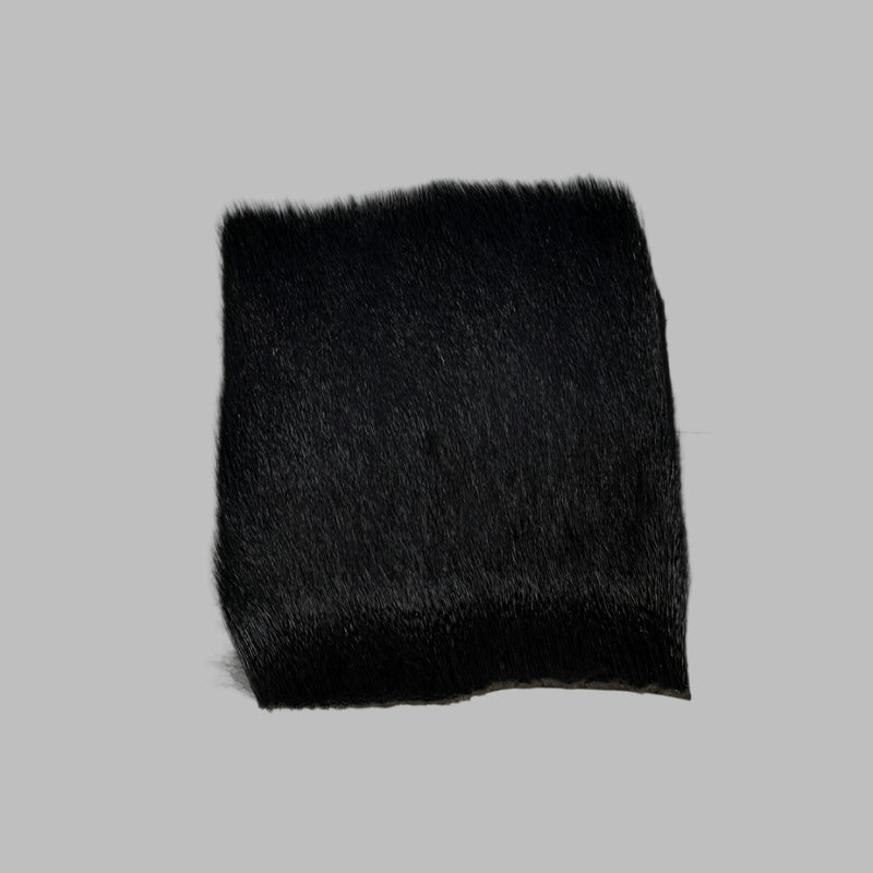 Deer short fine hair swatch in black with short, fine fur