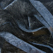 Crosscut rabbit fur strands in black with blue thread