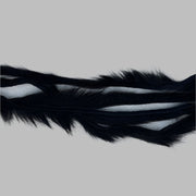 Zonker strips in black, long wavy fur strip with dark underfur visible