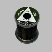 Spool of vinyl rib trim in black with coiled strand