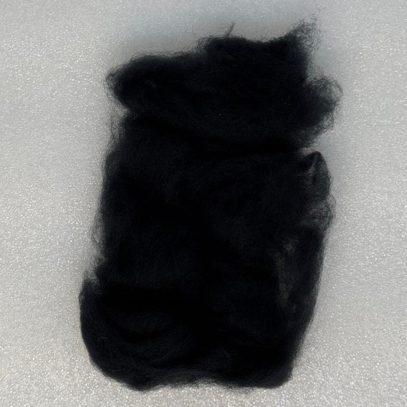 Black fly tying dubbing fibers clump, soft and fluffy