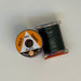 2 Spools of Black Tinsel from two angles, one with label showing