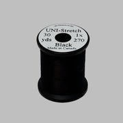 Black stretch thread spool with label on top, 30 yd