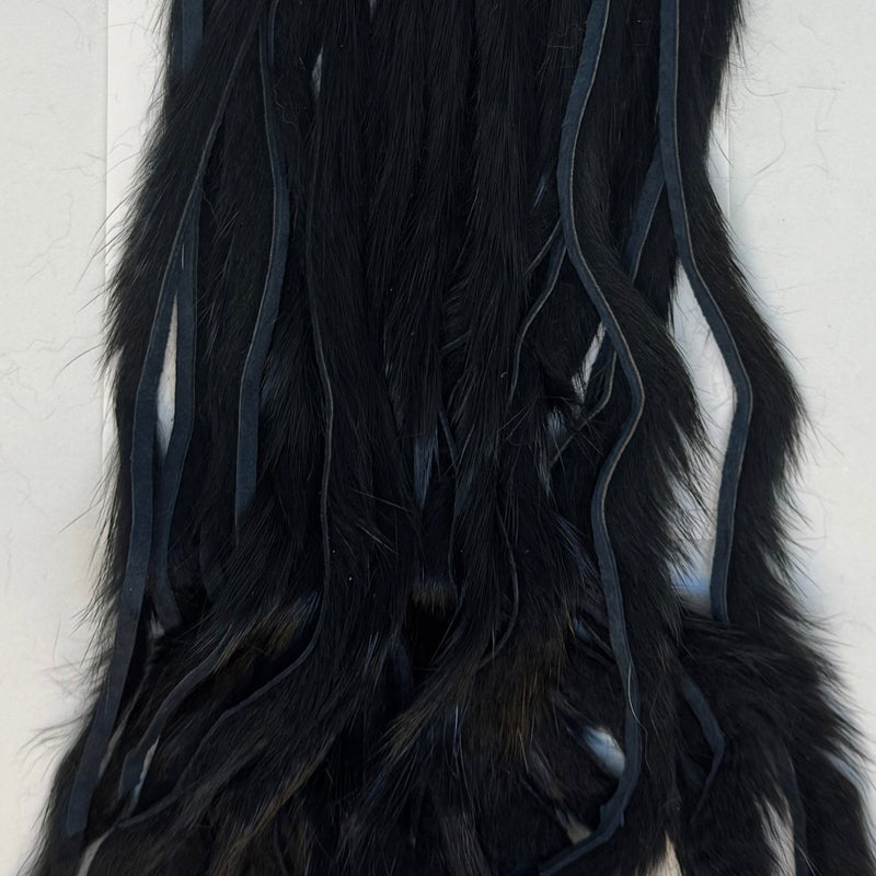 Rabbit half-skin fur hide close-up, zonked shag, black