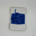 Blue fine chenille horizontally wrapped around white card