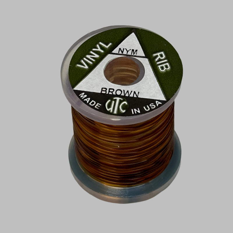 Vinyl D-rib spool of Brown vinyl trim, wound on a small reel