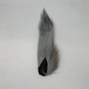 Gray bucktail tuft with black base