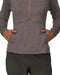Person wearing a pullover with a half zipper and black pants on a white background