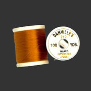 Waxed flymaster plus thread spool, burnt orange-brown color