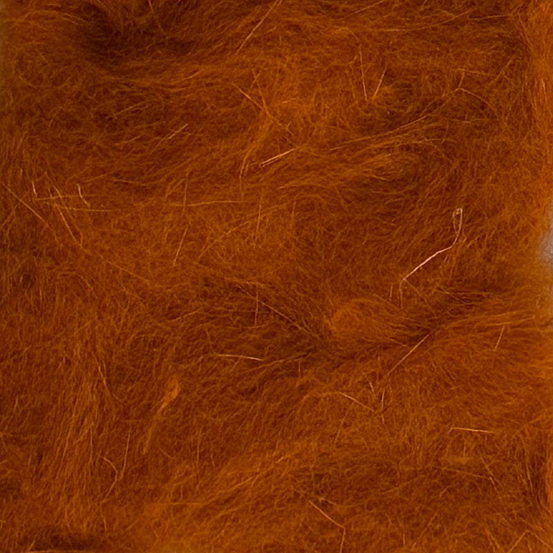 Rabbit dubbing material, dark amber brown loose fibers