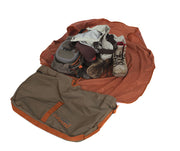 Fishpond Burrito Wader bag open with gray interior and orange sides, filled with gear