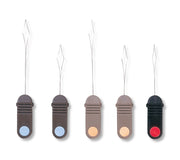 Set of threader tools in dark, tan, beige and black with metal needles