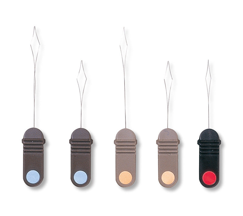 Set of threader tools in dark, tan, beige and black with metal needles