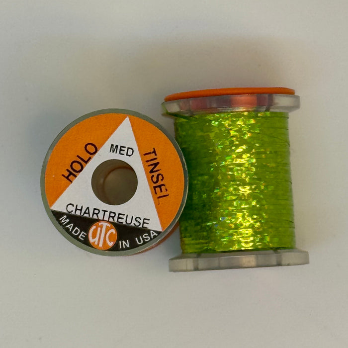2 Spools of Chartreuse Tinsel from two angles, one with label showing
