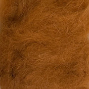 Rabbit dubbing material, tan brown loose fibers