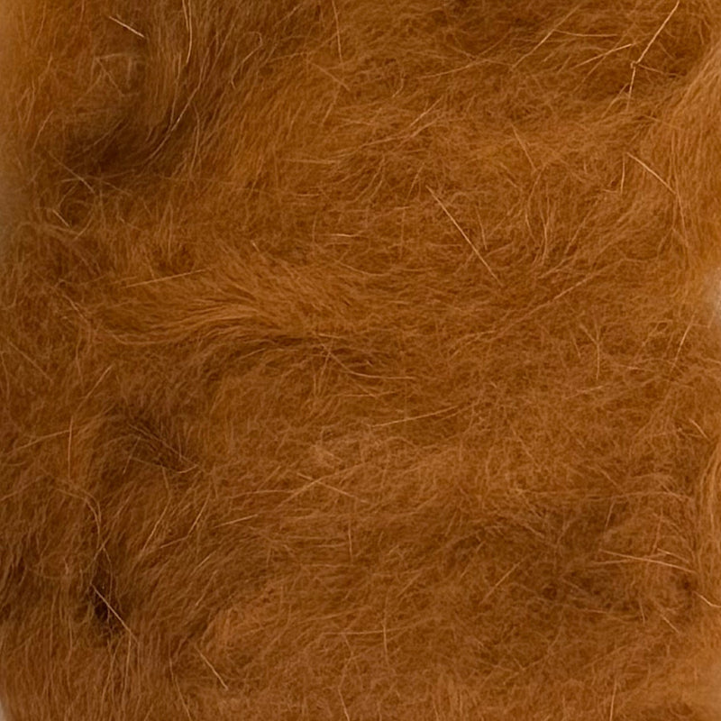 Rabbit dubbing material, tan brown loose fibers