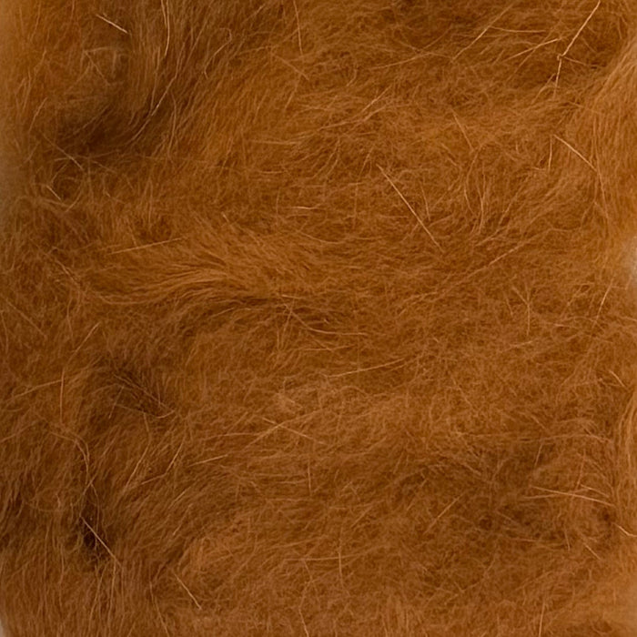 Close up of cinnamon colored dubbing
