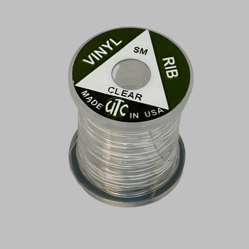 Spool of vinyl rib trim in clear with coiled strand