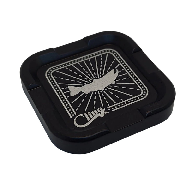 Cling Mag Grab in black square tray with butterfly graphic and Cling logo
