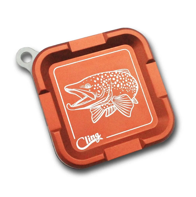 Mag Grab with fish lure graphic on orange square base