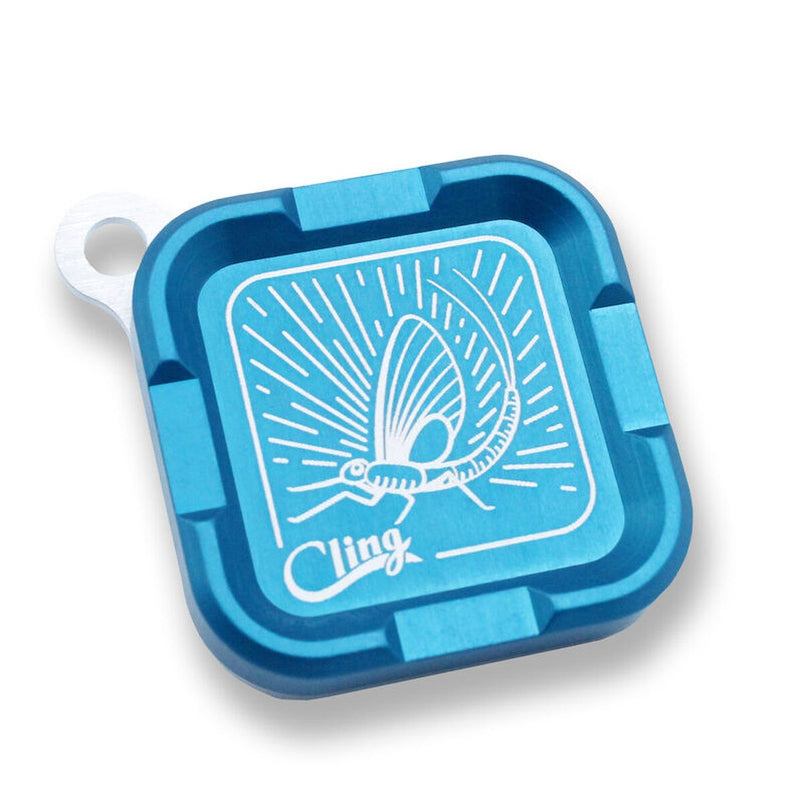 Mag Grab with circular fish graphic on blue square base