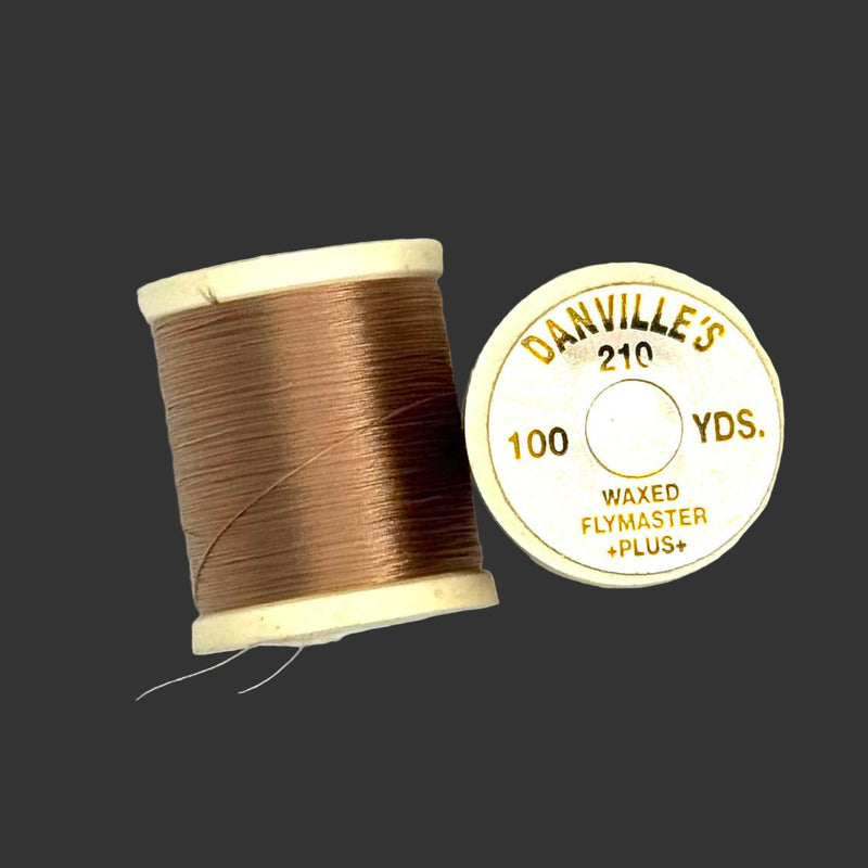 Waxed flymaster plus thread spool, tan brown color