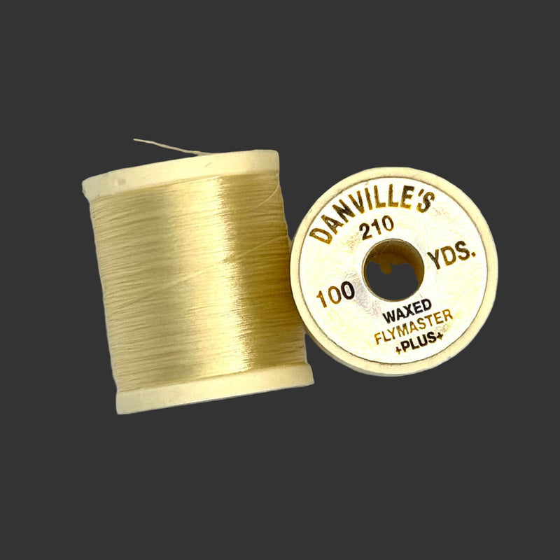 Waxed flymaster plus thread spool in light gold, with printed label