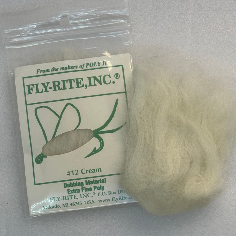 Cream dubbing material fibers in a clear bag with label