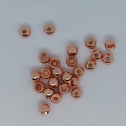 Cyclops beads rose gold round beads with center hole