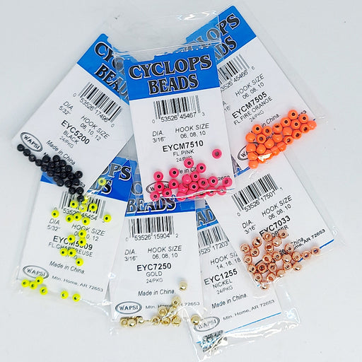 Close up 7 packages of Cyclops Beads Various colors for fly tying