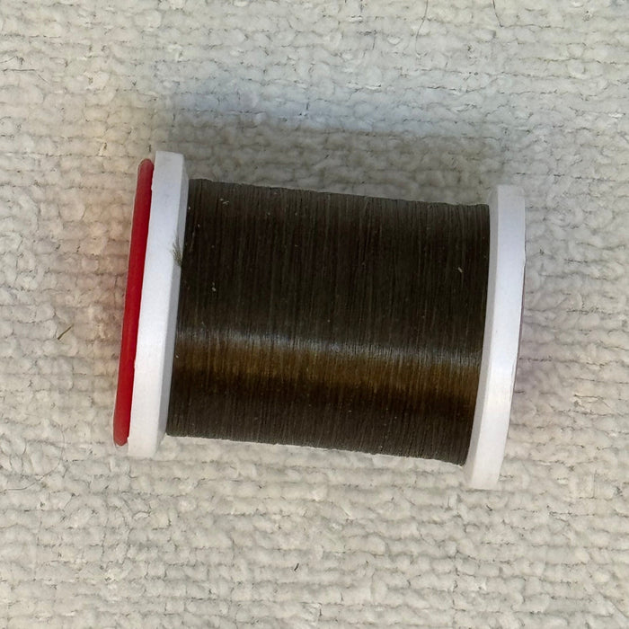 Close up dark brown ultra thread