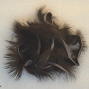 Crosscut rabbit fur strands in dark brown