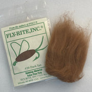 Dark tan dubbing material fibers in a clear bag with label