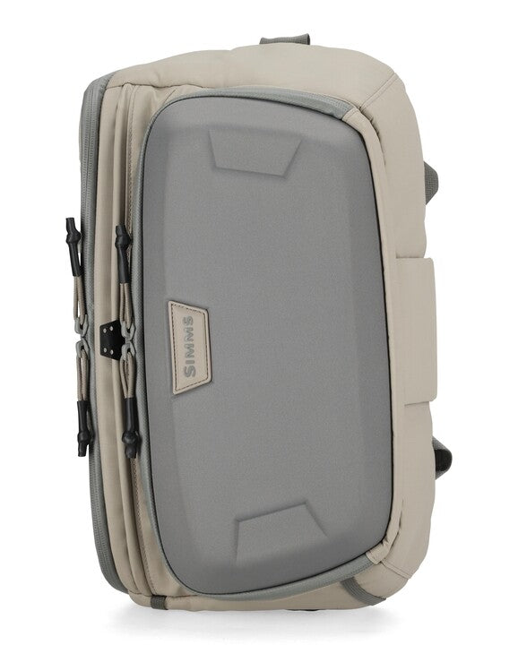 Simms sling pack in Dolomite, gray front panel with SIMMS logo patch