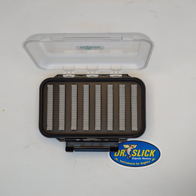 Dr. Slick fly fishing gift set open case with foam organizer slots and blue label