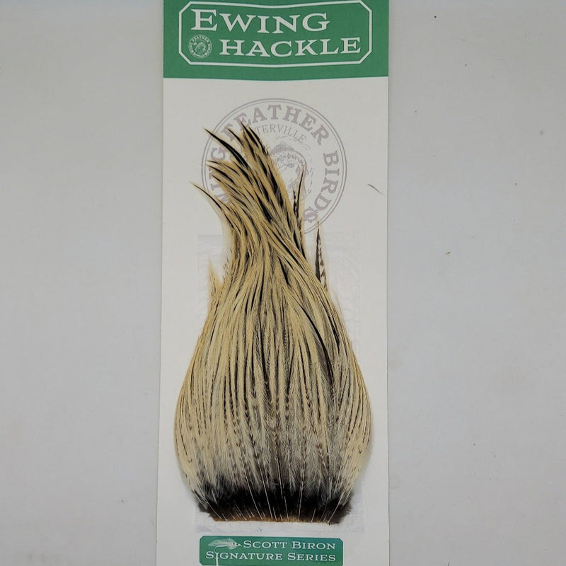Tan and dark feather hackle on card, tapered plume with fine fibers
