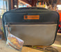 Fishpond fly tying kit case with zip closure, front mesh pocket, and attached tag