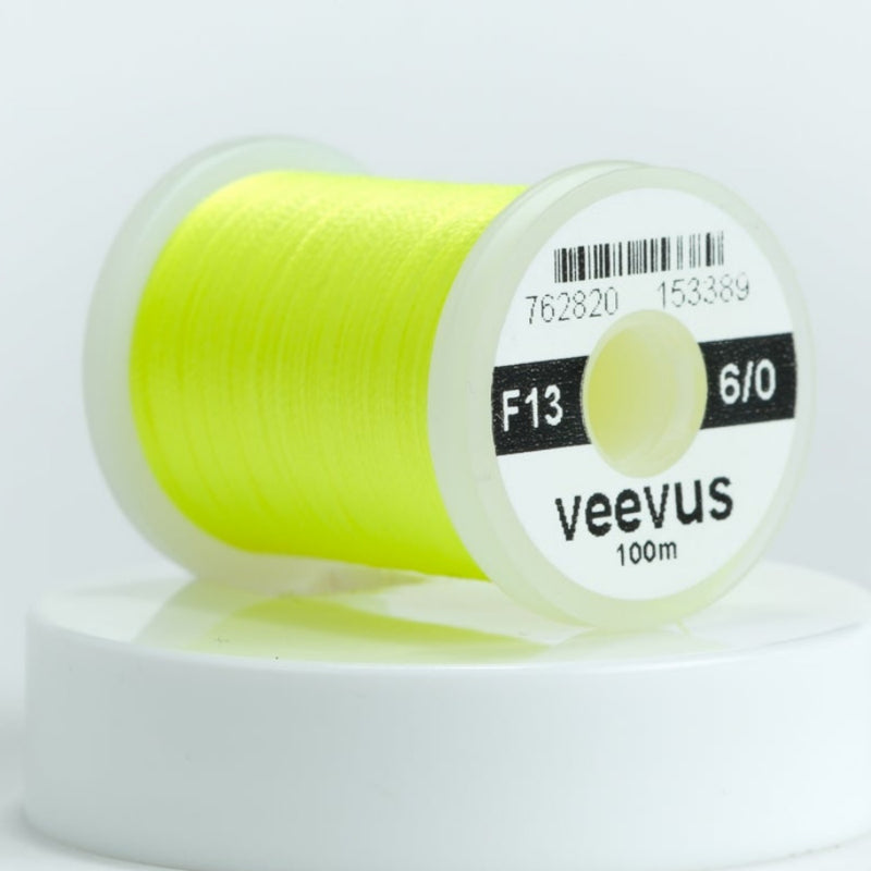 Fluorescent yellow 6/0 sewing thread spool, veevus brand label on round bobbin