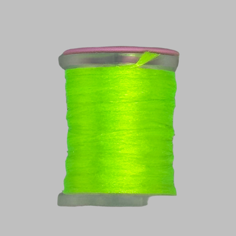 Neon yellow Antron yarn spool with clear plastic rim and end caps