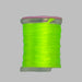 Close up spool of fluorescent chartreuse Antron yarn