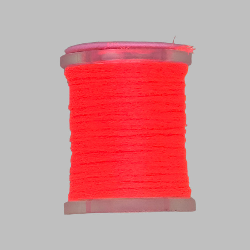 UTC Antron yarn spool in bright red on clear bobbin with pink top ring